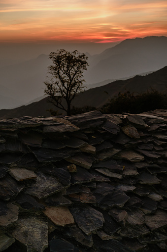 Roof of a stone hut crafted from flat, quarried rocks in the stunning landscapes of Tehri Garhwal, Himalayan Uttarakhand