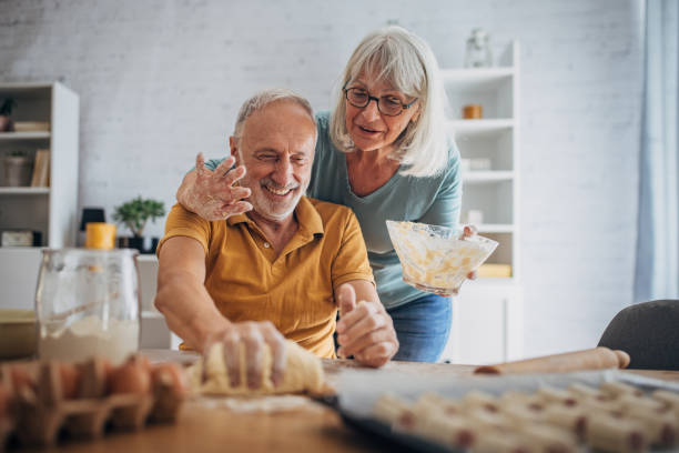 istock Couple preparing food together 1691930575
