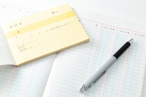 istock Account book and receipt on a white background. 1691932278