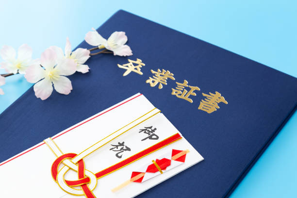 istock Graduation certificate and congratulatory money. 1691933383