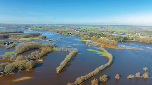 istock Vecht river high water level flooding at the Vilsteren weir drone view 1691963826