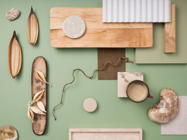 istock Stylish flat lay composition in green and brown color palette with textile and paint samples, lamella panels and tiles. Architect and interior designer moodboard. Top view. Copy space. 1691964979