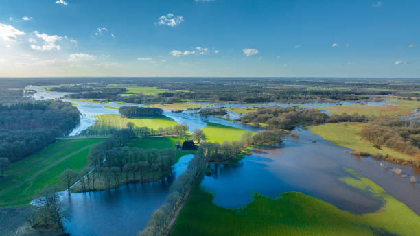 istock Vecht river high water level flooding at the Junne weir drone view 1691965513
