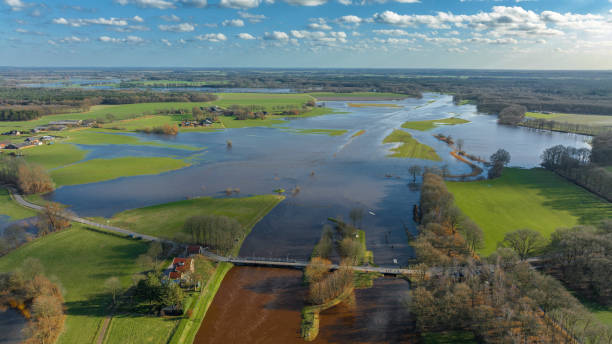 istock Vecht river high water level flooding at the Junne weir drone view 1691966163
