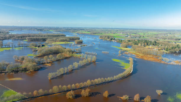 istock Vecht river high water level flooding at the Vilsteren weir drone view 1691967306