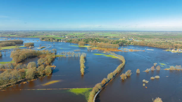 istock Vecht river high water level flooding at the Vilsteren weir drone view 1691970265