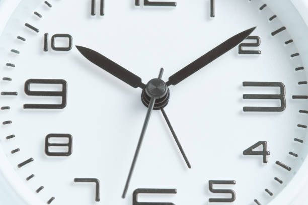 istock Close-up of a white clock face, ten o'clock. 1691976731