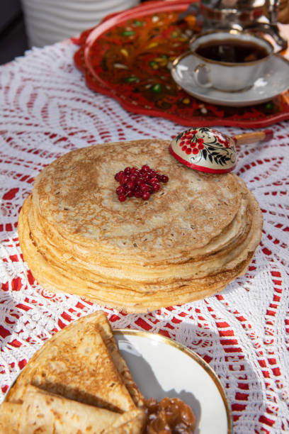 istock Russian pancake blini with berries and sour cream 1691977850