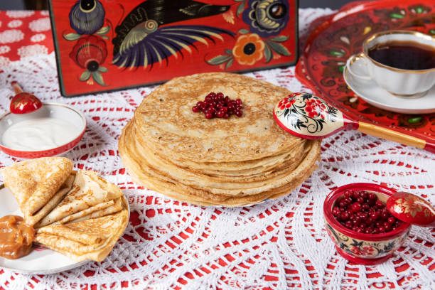 istock Russian pancake blini with berries and sour cream 1691977853
