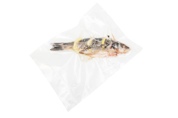 istock Fish with lemon and rosemary in a vacuum package 1691977857
