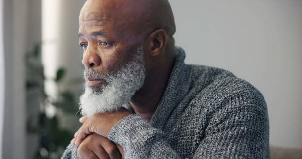istock Depression, sad and senior man at home with mourning and memory with mental health problem. Elderly male person, sorry and anxiety in a house feeling disappointed in retirement with grief and fail 1691987397