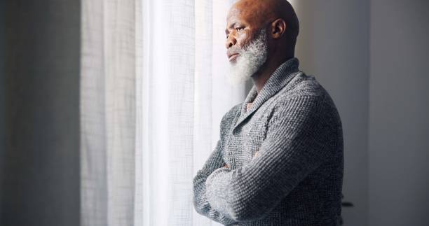 istock Depressed, sad and senior man in home with mourning and memory with mental health problem. Elderly male person, sorry and anxiety in a house feeling disappointed in retirement with grief and fail 1691987405