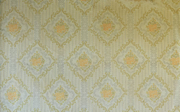 istock Old wallpaper on the wall. Old wallpaper for texture or background. 1691990894