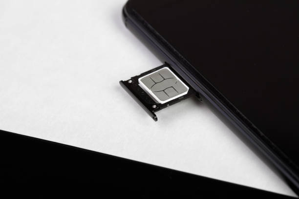 istock SIM card inserted into the sim card tray of a smartphone 1691991467