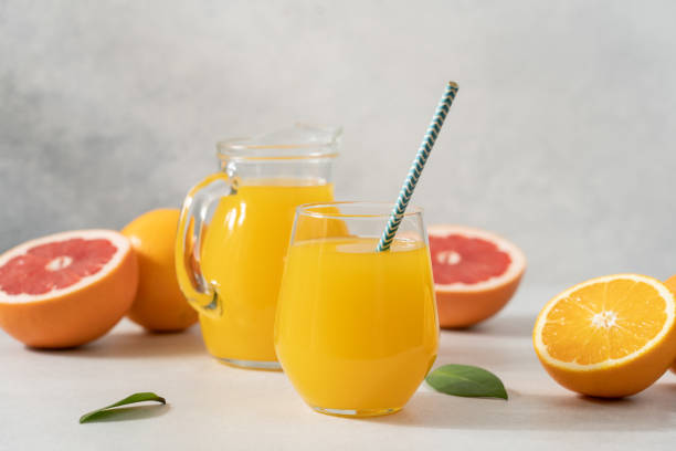 istock Fresh Orange juice in glass 1691999880