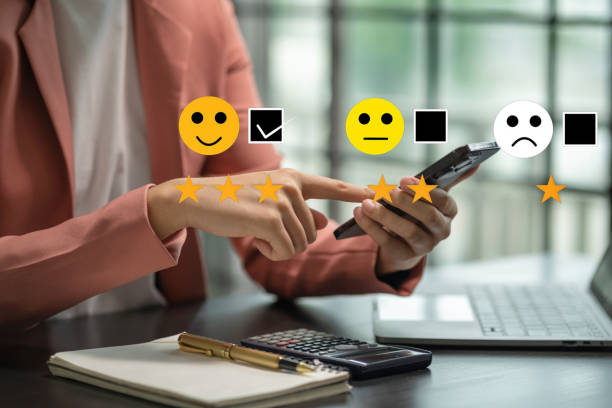 istock User give rating to service experience on online application, Customer review satisfaction feedback survey concept. 1692003470