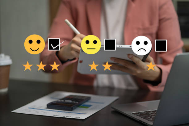 istock User give rating to service experience on online application, Customer review satisfaction feedback survey concept. 1692003495