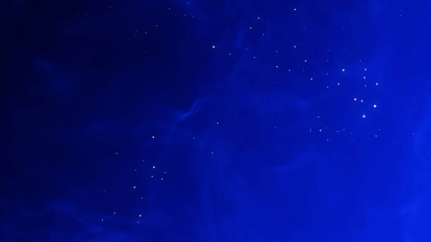 istock Dark blue black abstract background with golden particles. Wavy curve lines design. 1692024231