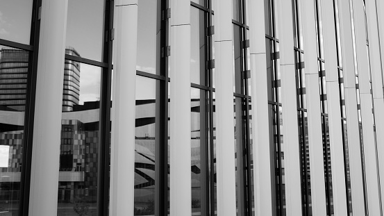 black and white office architecture. modern glass building with steel