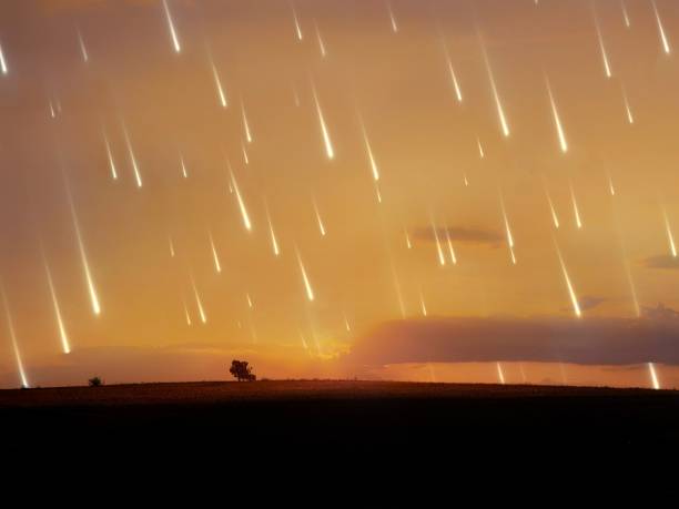 istock Starfall at sunset. Meteor rain in the sky. 1692029335