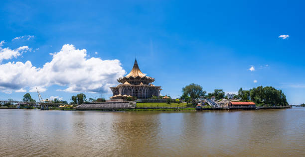 Kuching city waterfront panoramic view with river and landmarks in Sarawak, Malaysia. Kuching city waterfront panorama cityscape with river and landmarks in Sarawak, Malaysia. kuching waterfront stock pictures, royalty-free photos & images