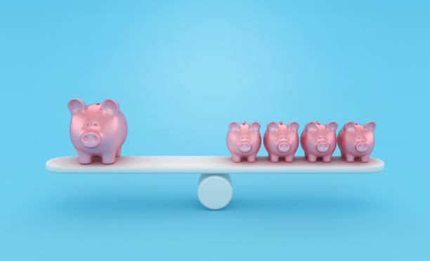 istock Piggy Bank on Seesaw 1692060440