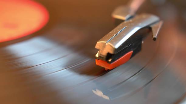 istock Vinyl Record Played on Vintage Turntable Gramophone Close-up 1692066743
