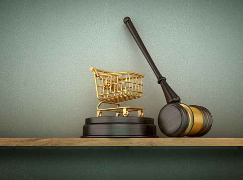Shopping Cart with Gavel on Shelf - Wall Background - 3D rendering