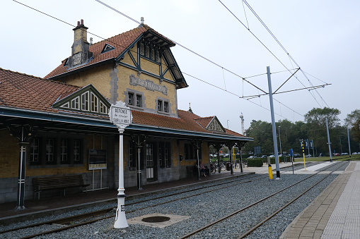 Exterior view of old train staion in De Haan, Belgium on September 17, 2023.