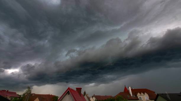 istock Heavy Storm Clouds Moving Over CIty Time Lapse 1692101663