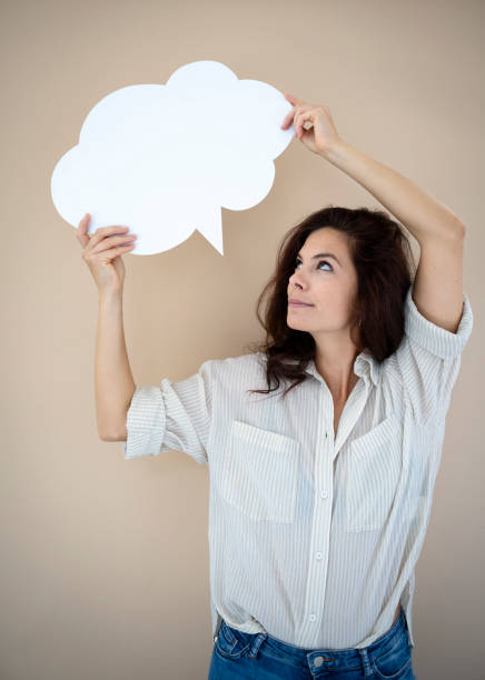 istock beautiful woman with white speech bubble 1692107917