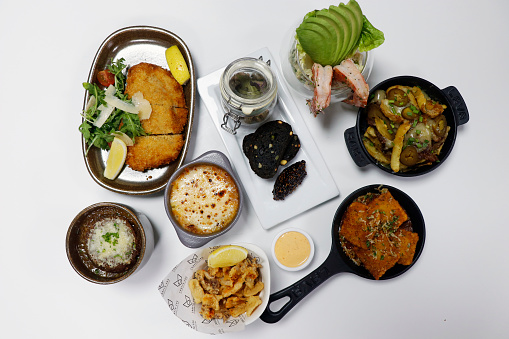 assorted multi cuisine foods on a white background