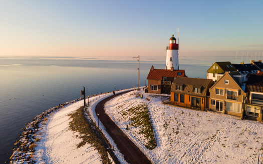 Lighthouse of Urk Netherlands during winter with snow cold weather in the Netherlands.