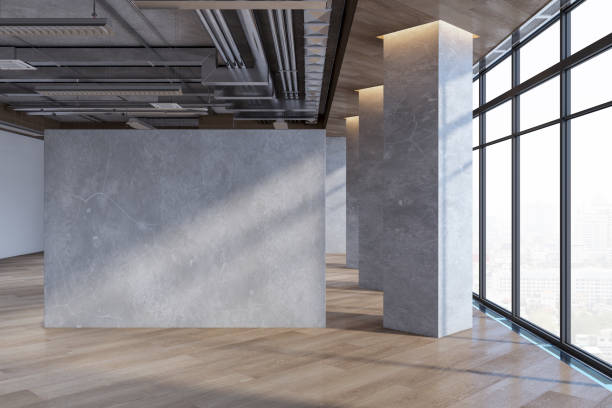 istock Clean empty spacious concrete interior with mock up place on wall, wooden flooring, windows, city view and daylight. 3D Rendering. 1692141162