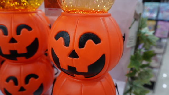 plastic pumpkin bucket for storing candy trick or treat in Halloween festival