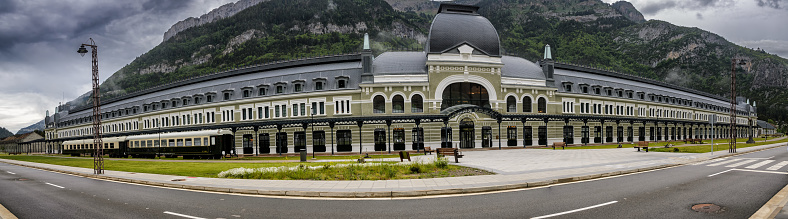 Canfranc Station, Spain, is a historic railway station known for its grandeur and architectural beauty. With its ornate facade and sprawling size, it stands as a symbol of a bygone era of luxury and cross-border travel.