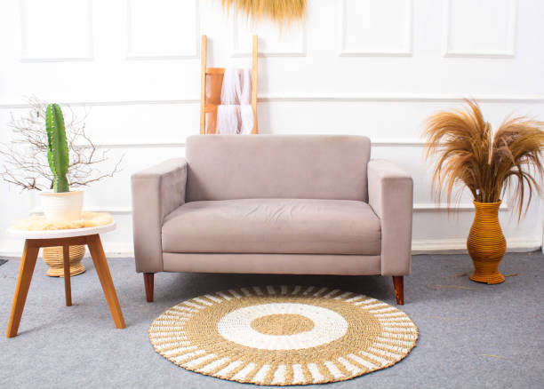 istock Jambi, Indonesia; indoor decoration with sofa in gray 1692151274
