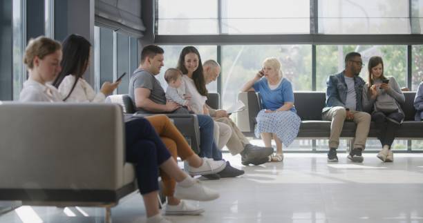 istock Diverse multicultural people sit on couches in clinic lobby area 1692151580