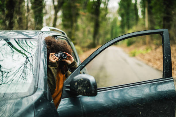 istock Young woman with afro hairstyle exploring the woods 1692161853