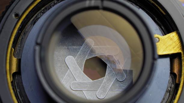 istock Repairing Camera Lens Disassembling Lens and Mechanical Parts Close-up 1692181352