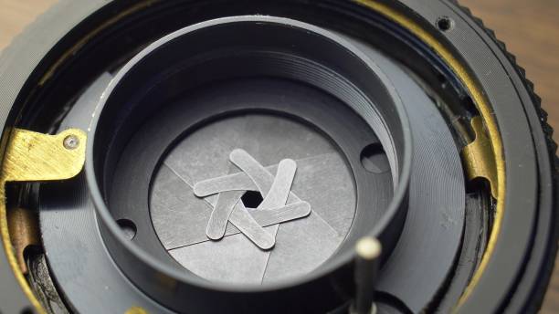 istock Repairing Camera Lens Disassembling Lens and Mechanical Parts Close-up 1692181354