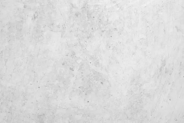 Photo of The surface of a raw concrete wall background