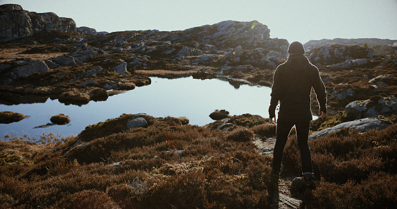 Man hiking outdoors in Norway: adventures in the wilderness