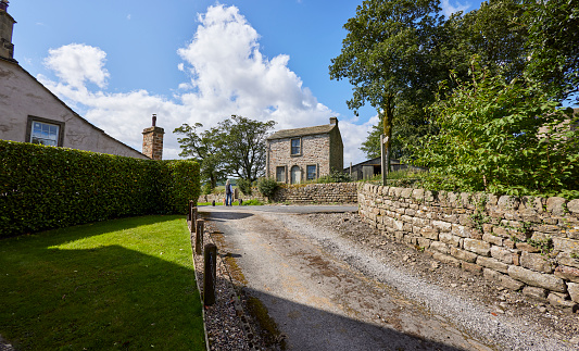 Traditional stone cottages in the Cotswolds region of England