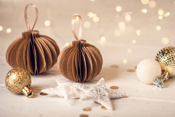 Christmas decorations on white wooden table. Front view.