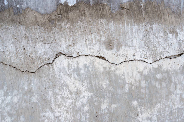 A cracked concrete wall background
