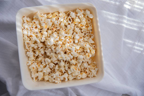 istock white homemade popcorn in a white bowl,white background , close up 1692256278