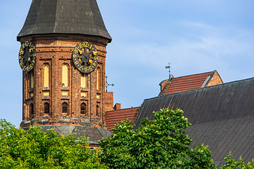 Close-up of clock tower of Dome Cathedral of Our Lady and Saint Adalbert.  East Prussia. Historical district of city of Koenigsberg - Kneiphof (Island of Immanuel Kant)