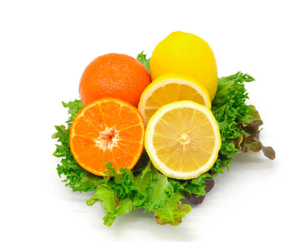 istock Orange and lemon on salad leaves 1692268890