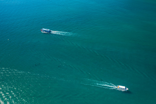 Drone view tourist boats moving on Nha Trang sea, Khanh Hoa province, central Vietnam
